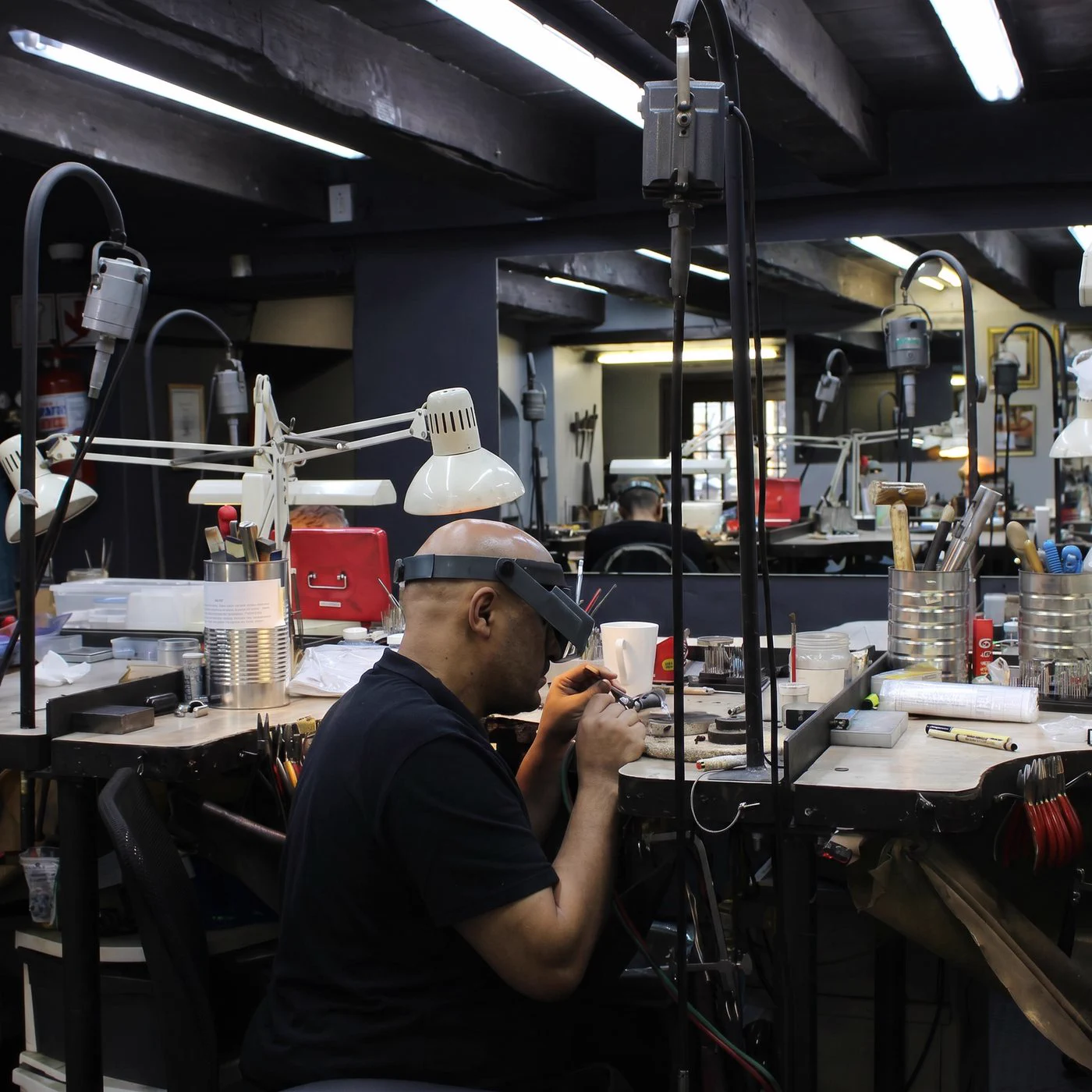 The Prins and Prins atelier, goldsmiths at their benches inside Huguenot House