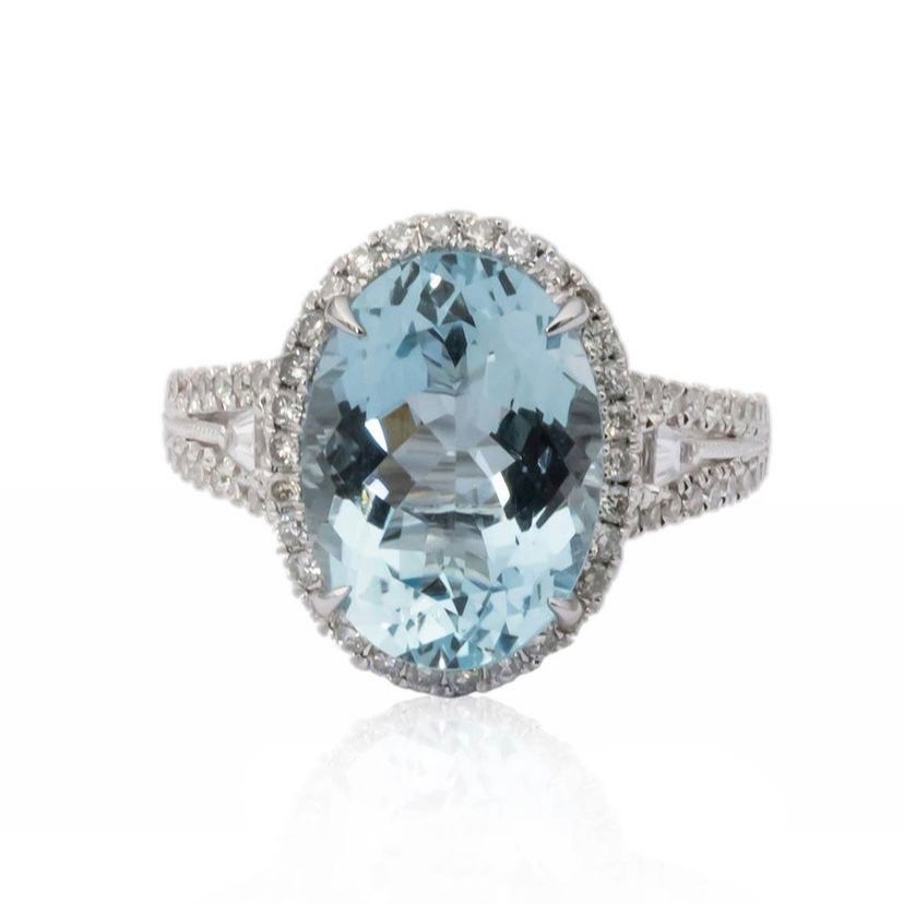 White gold claw set topaz ring